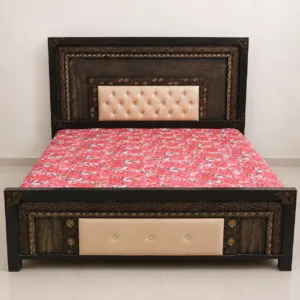 carved wood bed frame with tufted gold headboard and footboard
